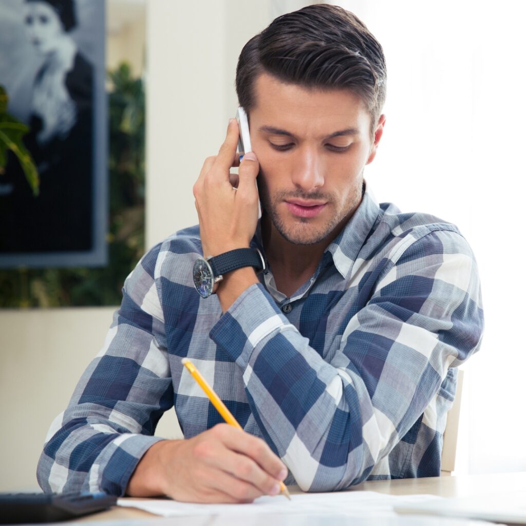 image of a man on the phone